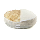 Stylish dog bed in a warm dark beige tone, made from eco-friendly faux fur. The oval shape promotes healthy sleep, while the orthopedic filling aids joint recovery and alleviates separation anxiety.