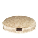  Luxurious dog bed in a dark beige shade, designed for pets seeking comfort and security. The oval shape wraps the body, while the orthopedic filling supports healthy sleep and recovery.