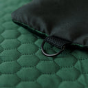 Robust travel dog bed in a rich forest green shade. Made from premium, abrasion- and moisture-resistant materials. Offers excellent insulation, comfort, and easy portability – ideal for long outdoor trips.