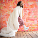 "Rosum" faux fur blanket in gift-ready packaging – perfect present for Christmas, Valentine's Day, birthdays, weddings or Mother's Day. Elegant, eco-friendly and irresistibly cozy.