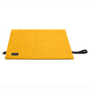 Vibrant yellow travel mat for dogs, made from high-quality, pet-friendly materials. Offers excellent ground insulation, easy to carry, lightweight, and built to handle outdoor conditions.